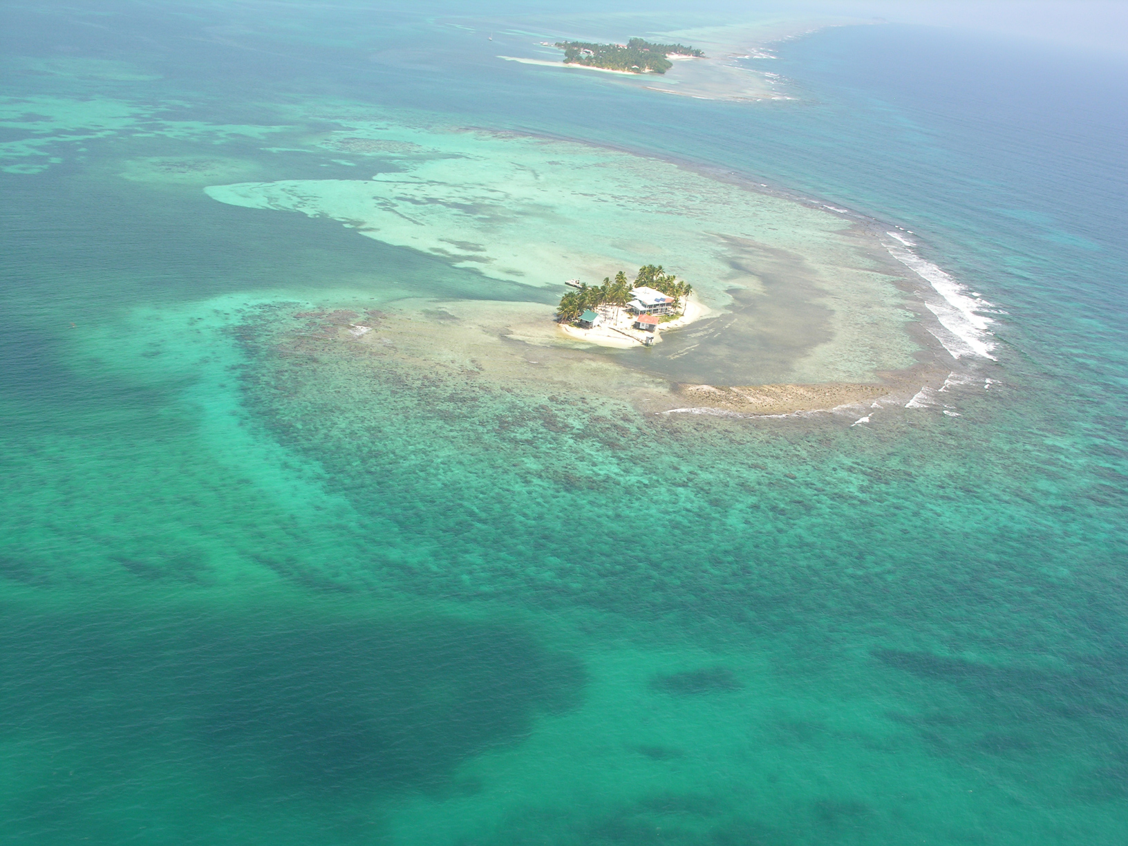 Carrie Bow Cay field station sits in the blue and turquoise waters of Belize.