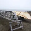 a boat frame and a frame covered in seal skin