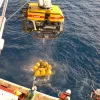 NOAA’s New Millennium Observatory was set up to study geologic, chemical, and biologic interactions along the mid-ocean ridge system. Here, a remotely operated vehicle (ROPOS) recovers a volcano monitor in the Juan de Fuca Ridge in the Pacific, west of Oregon.