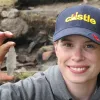 A researcher holds a maritime archaic point made of ramah chert that was found at Hare Harbor in Quebec, Canada in 2011
