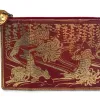 A bright red clutch bag made from fish leather and patterned with shimmering gold koi fish imagery.