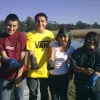 Students studying climate change and ocean acidity hold crabs.
