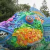 The colorful parrotfish sculpture is made entirely of ocean plastic trash.
