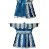 A blue, silver, and black fish skin robe displayed hanging from a rod. The robe is created from multiple fish skin sewn together and dyed with indigo.