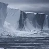 Antarctica is almost entirely covered by ice sheets up to two miles (3 km) thick, which contain roughly 70% of the world’s freshwater.