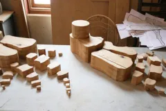 Blocks of newly cut wood in the shape of bones.