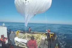 a balloon on the back of a boat