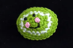 a green crochet bacteria