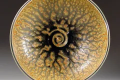 Artist Joan Lederman glazes her work with deep ocean sediments.