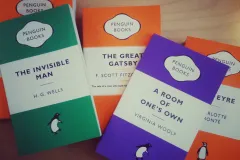Multiple penguin books of different genres