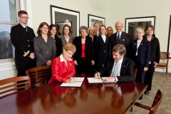 A formal signing of a memo of understanding