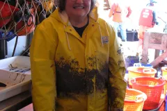 Museum Specialist Ruth Gibbons, aboard a deep sea research vessel processing specimens