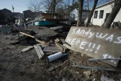 sign in hurricane wreckage