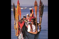 Members of the Squamish Nation paddle to a 1997 festival celebrating Native canoe arts.