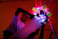 Artist Shih Chieh Huang's creations are often composed of lights, computer parts, and plastic refuse.