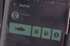 An image of a cell phone displaying the Fish App. 