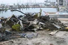 Marine debris collected in a harbor after Hurricane Katrina. 