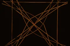 Diagonally criss-crossed palm strips in a square frame of palm strips