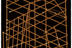 A square frame of interwoven palm strips and cowrie shells. 