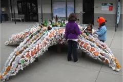 A life-size sea star sculpture made from plastic trash. 