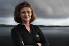 Nancy standing by the ocean
