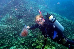 A woman scuba diving