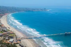 a beach and a long pier