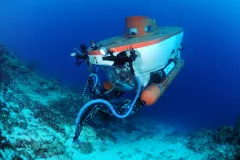a white and orange submersible
