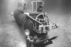 an old submersible sits at the bottom of the seafloor