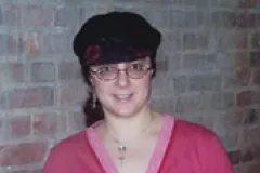 A headshot of Sharon Katz Cooper looking at camera. 