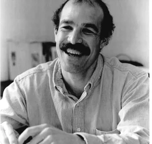 Andy Solow smiling in a headshot