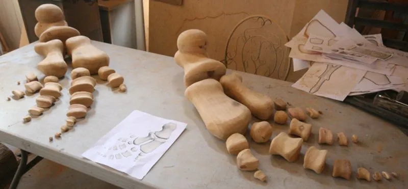 Carved Wooden Flippers Carved flipper bones made of wood.