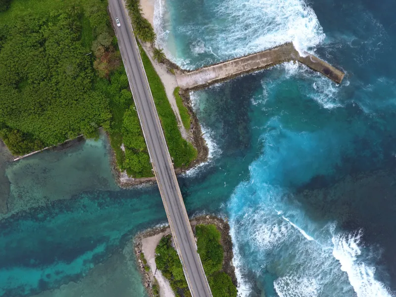 An aerial view of a roadway on an island