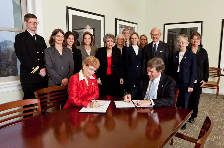 A formal signing of a memo of understanding