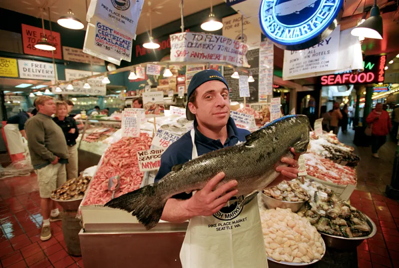 David Barouh displays fresh fish for sale at Seattle’s Pike Place Market