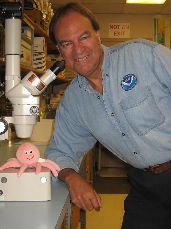 NOAA Marine Biologist Robert Brock with microscope