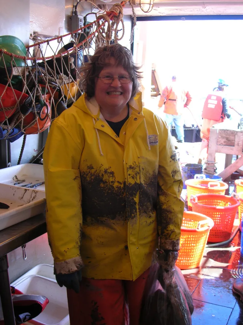 Museum Specialist Ruth Gibbons, aboard a deep sea research vessel processing specimens