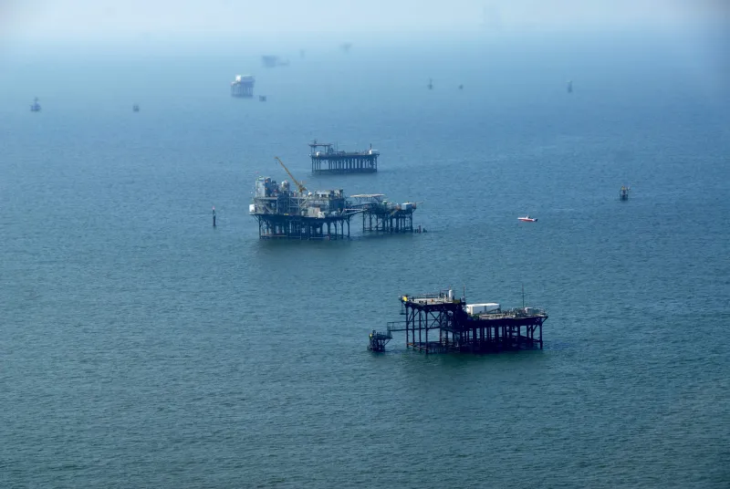 An aerial shot of oil rigs off the Louisiana coast.