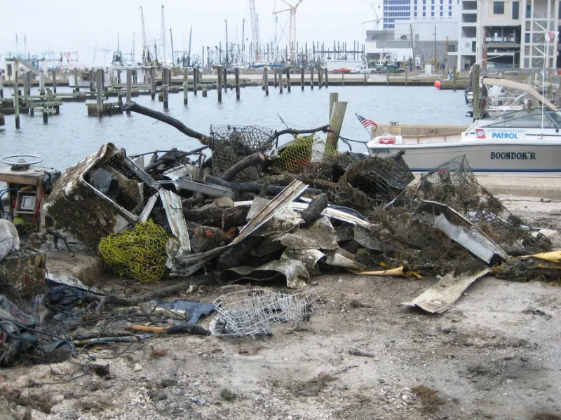 Marine debris collected in a harbor after Hurricane Katrina. Marine debris collected in a harbor after Hurricane Katrina.