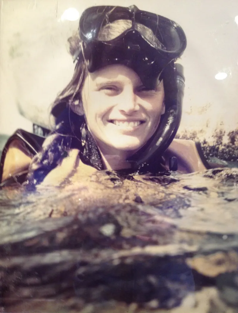 A woman with snorkel gear 