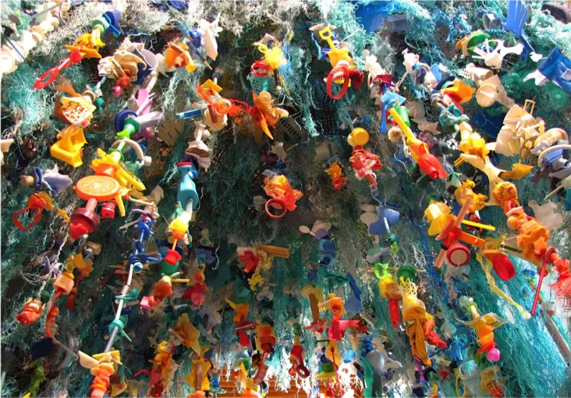 The Gyre is an abstract piece symbolizing the Great Pacific Garbage Patch, a large ocean vortex that collects trash from around the Pacific Ocean.