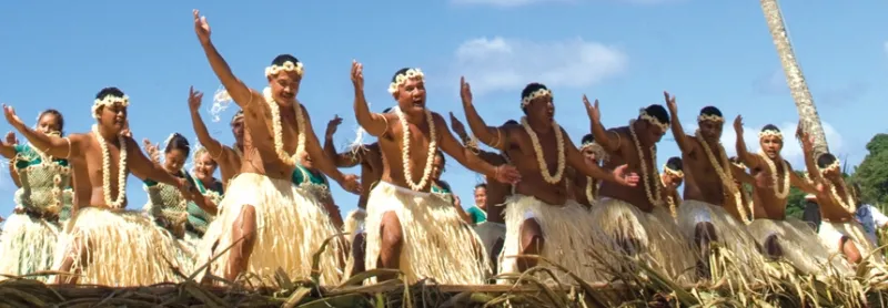 A large group of dancers from the island of Tokelau dance during fiafia, evening entertainment)