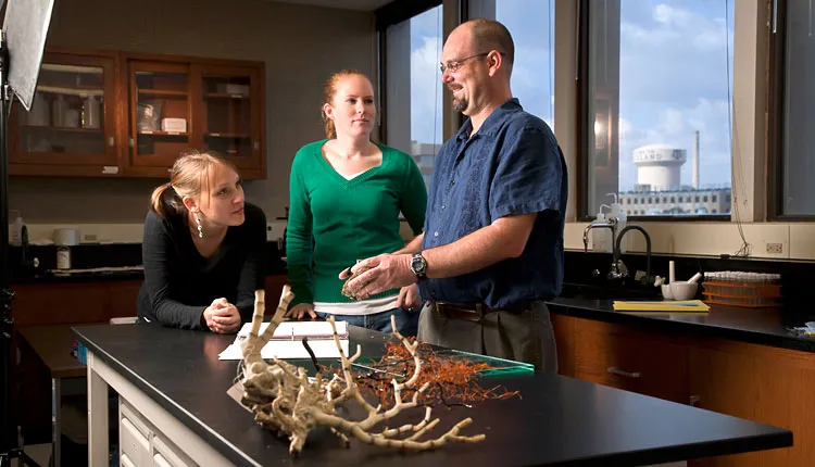 Dr. Brendan Roark discusses different methods of sampling deep-sea corals with undergraduate students at Texas A&M University.