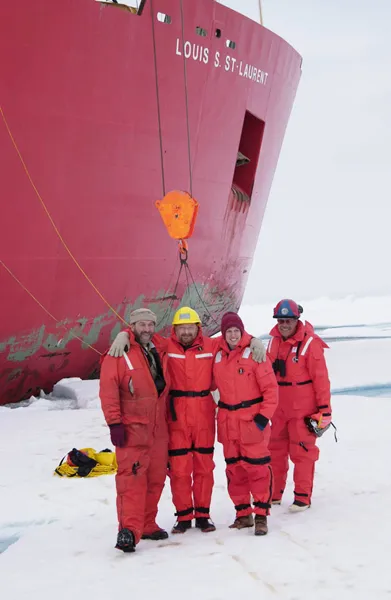Dr. Kathy Crane and colleagues stand on solid sea ice in the Canadian Arctic.