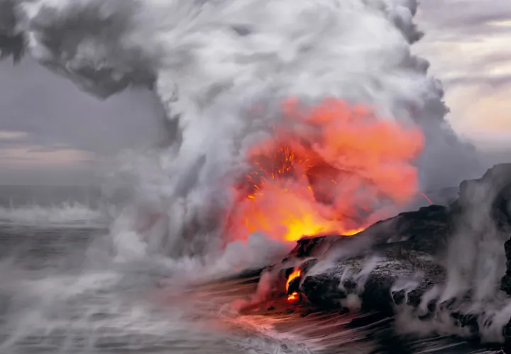 “In the upper left of this image I can visualize the profile of Pele, the fire goddess of Hawaiian folklore, as if she is whispering to the sea.” -- Nature's Best photographer, Peter Lik.Equipment Used to Capture the Shot: Canon EOS-1Ds Mark III; 5