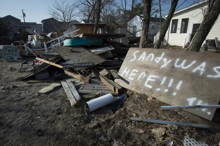 sign in hurricane wreckage