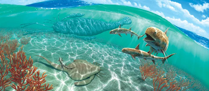 a reef scene with fish and large "sea scorpions"