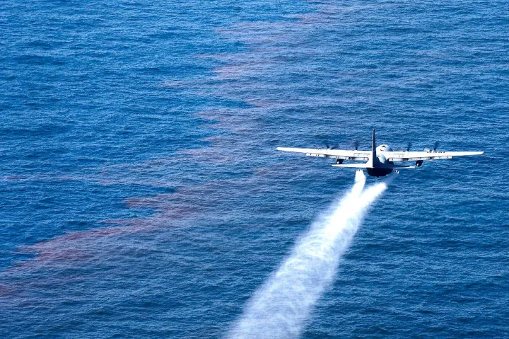 A C-130 Hercules from the Air Force Reserve Command deploys dispersant into the Gulf of Mexico May 5, 2010, as part of the Deepwater Horizon/BP oil spill response effort. 