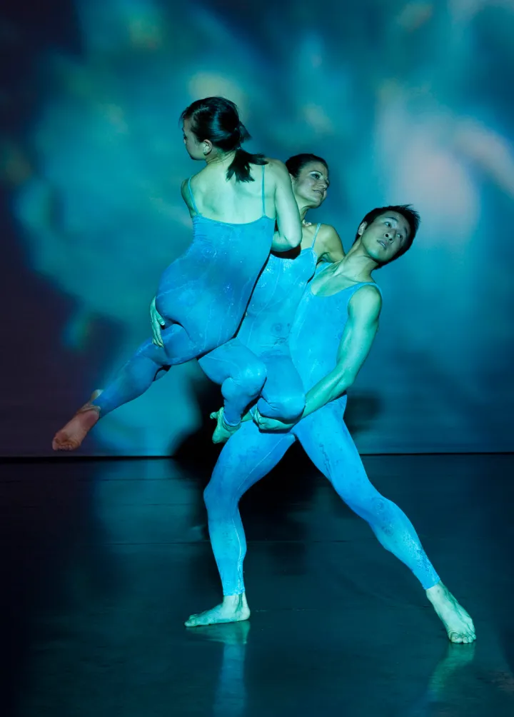 Three dancers dependent on one another, as in the food web.