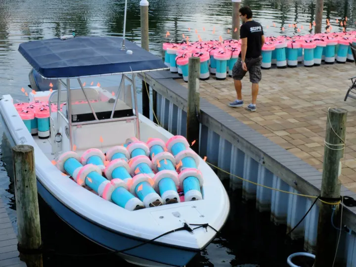 A boat full of SCOPE drifters waits to release small, biodegradable buoys that will travel throughout the Gulf of Mexico and send GPS coordinates to researchers.